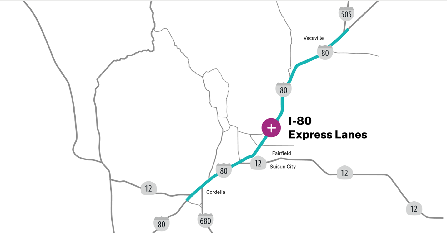 A person in a white sweater consults a mobile phone while writing on a notepad.